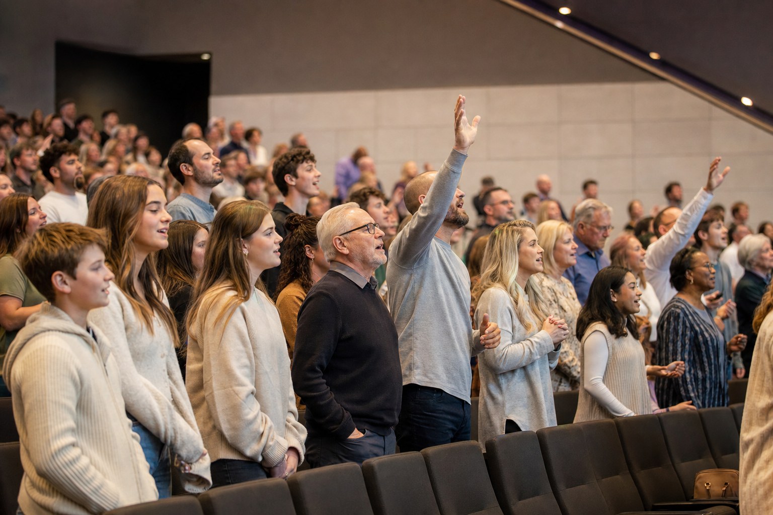 People worshiping together during a Wrenhaven Church gathering